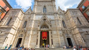 A grand cathedral with a prominent entrance, large steps leading up to it, and a crowd of people gathered in front. - Duomo Charme Studio by Wonderful Italy (Naples)