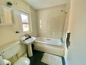 House, Multiple Beds | Bathroom | Combined shower/tub, deep soaking tub, hair dryer, towels