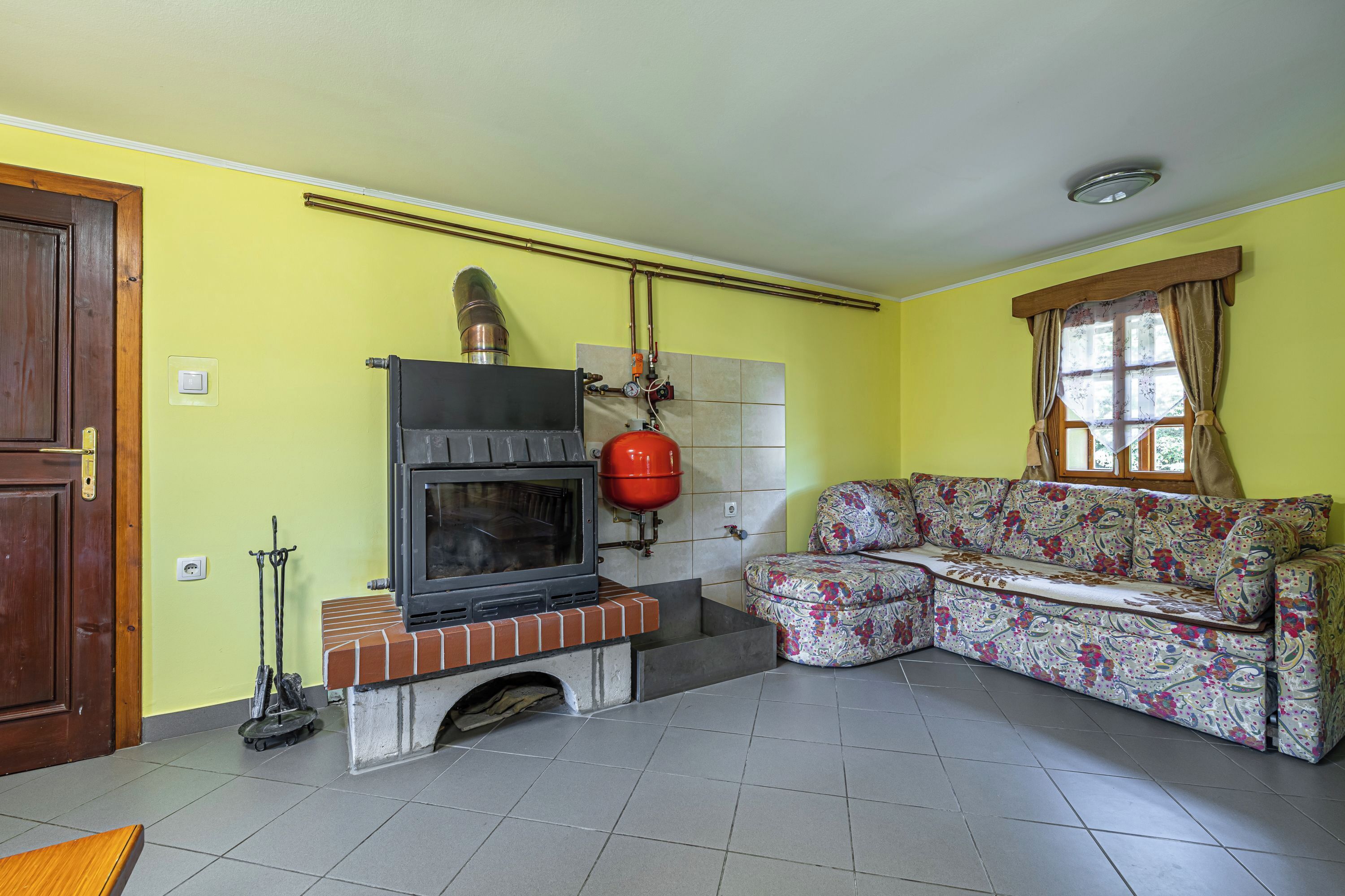 Family House, Multiple Bedrooms, 2 Bathrooms (Kunstek Farmhouse With Sauna) | Living area | 21-inch flat-screen TV with cable channels, TV, fireplace