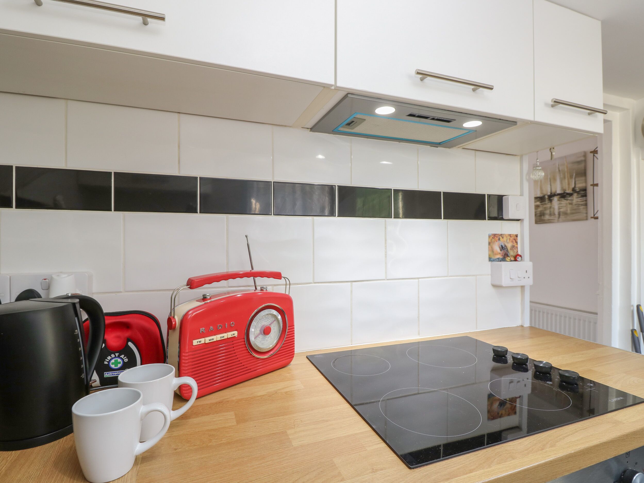 Fridge, electric kettle, toaster, cookware/dishes/utensils