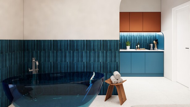 A modern bathroom with a large bathtub, a small wooden stool with towels, and a kitchen area in the background. - Suite Pina Ocean in Sorrento (Sorrento)