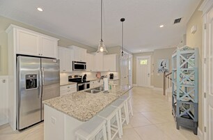 Fridge, oven, coffee/tea maker, toaster