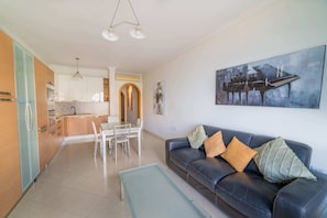 Basic Apartment, Multiple Beds | Living area