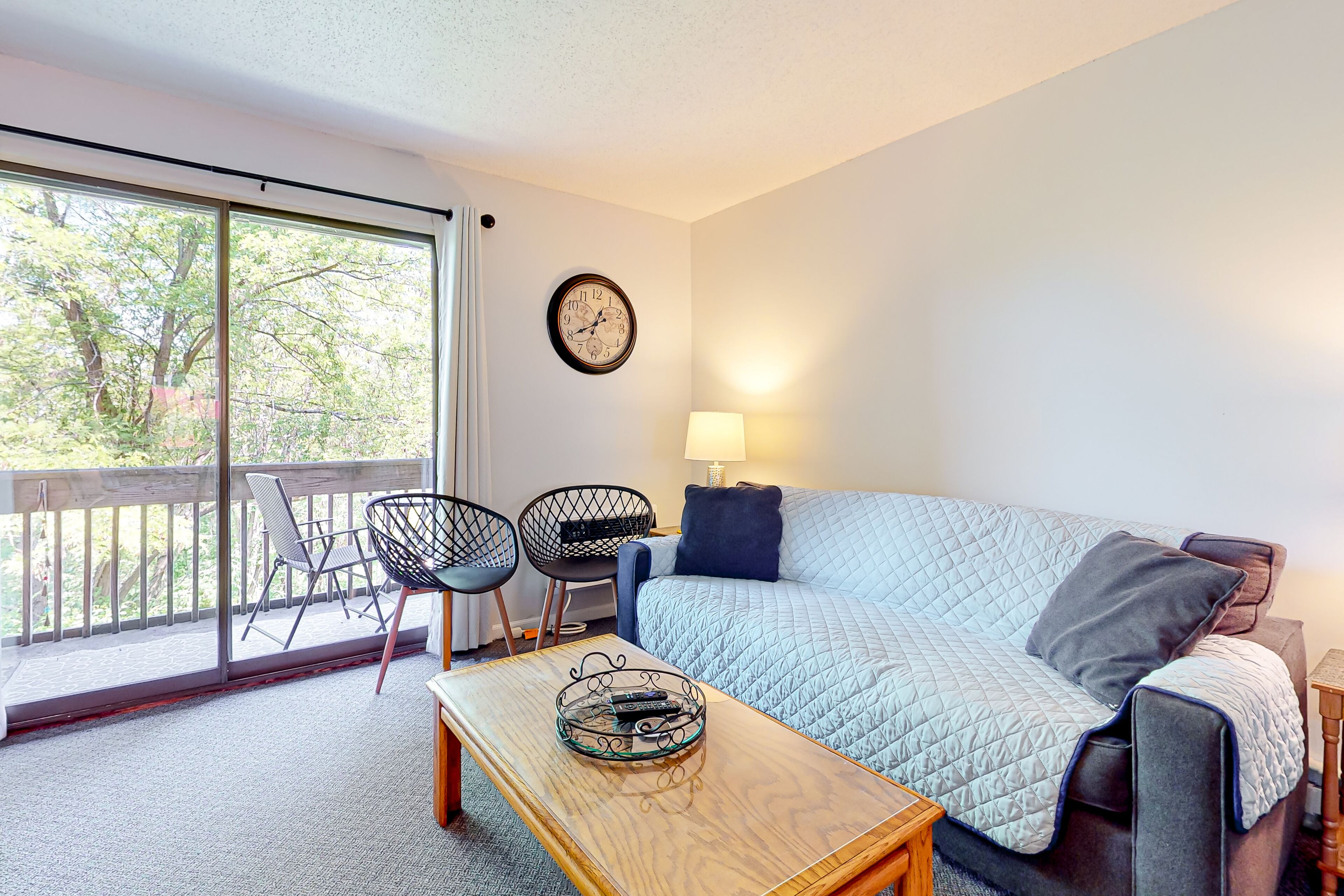 2nd-floor condo with a private balcony, on-site beach, outdoor pool, laundry