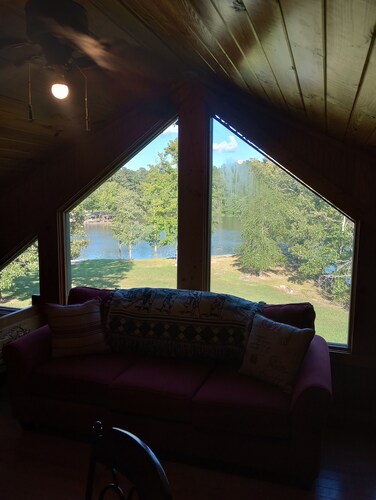 Cozy private cabin on 10 acres with 300+ feet of water front. Pet friendly.