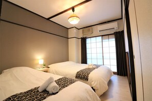 Apartemen Basic | 1 kamar tidur, Wi-Fi gratis, dan seprai linen