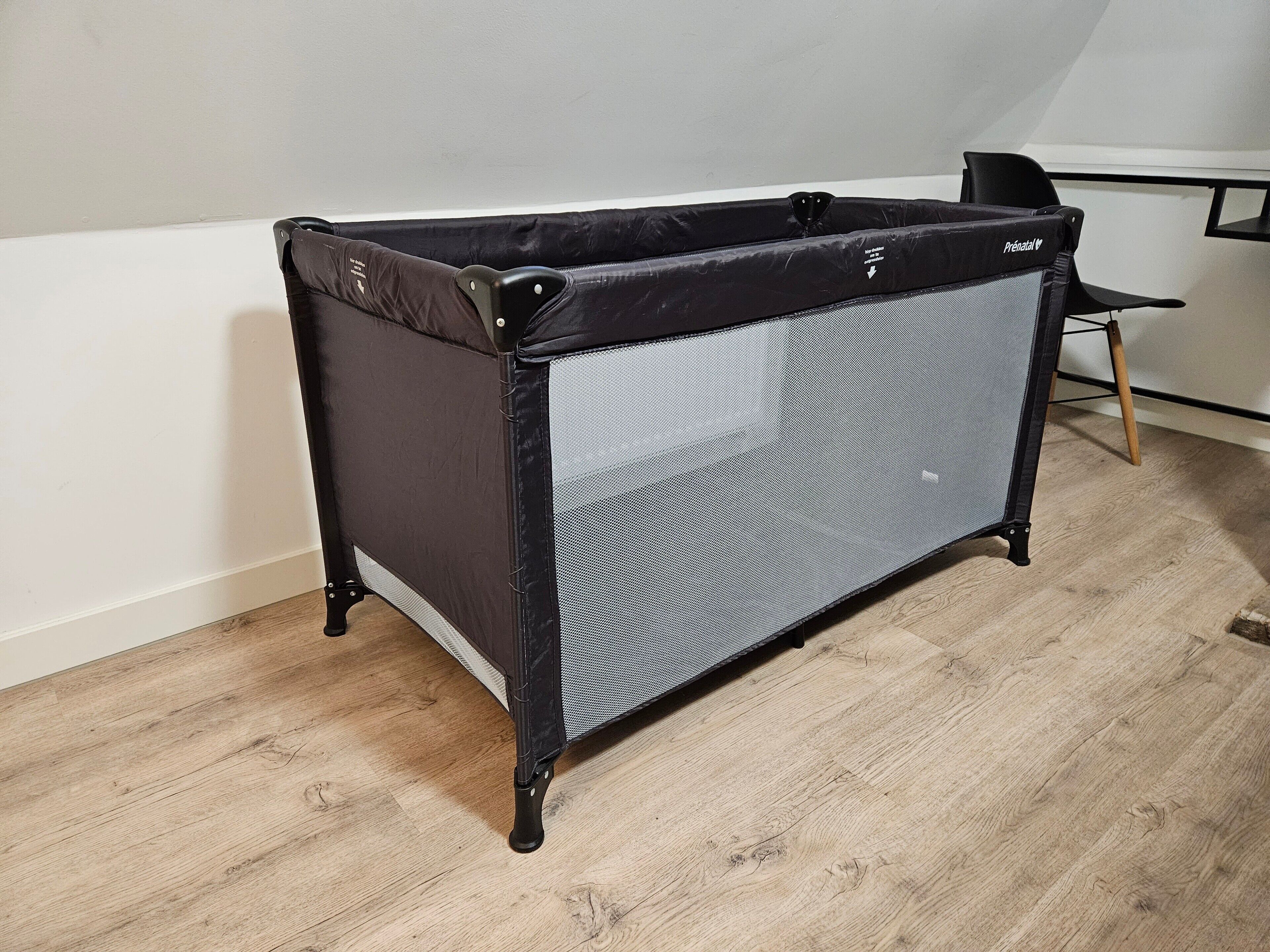 A compact, foldable storage unit with a mesh front panel, likely for organizing items.