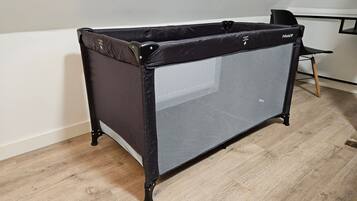 A compact, foldable storage unit with a mesh front panel, likely for organizing items.