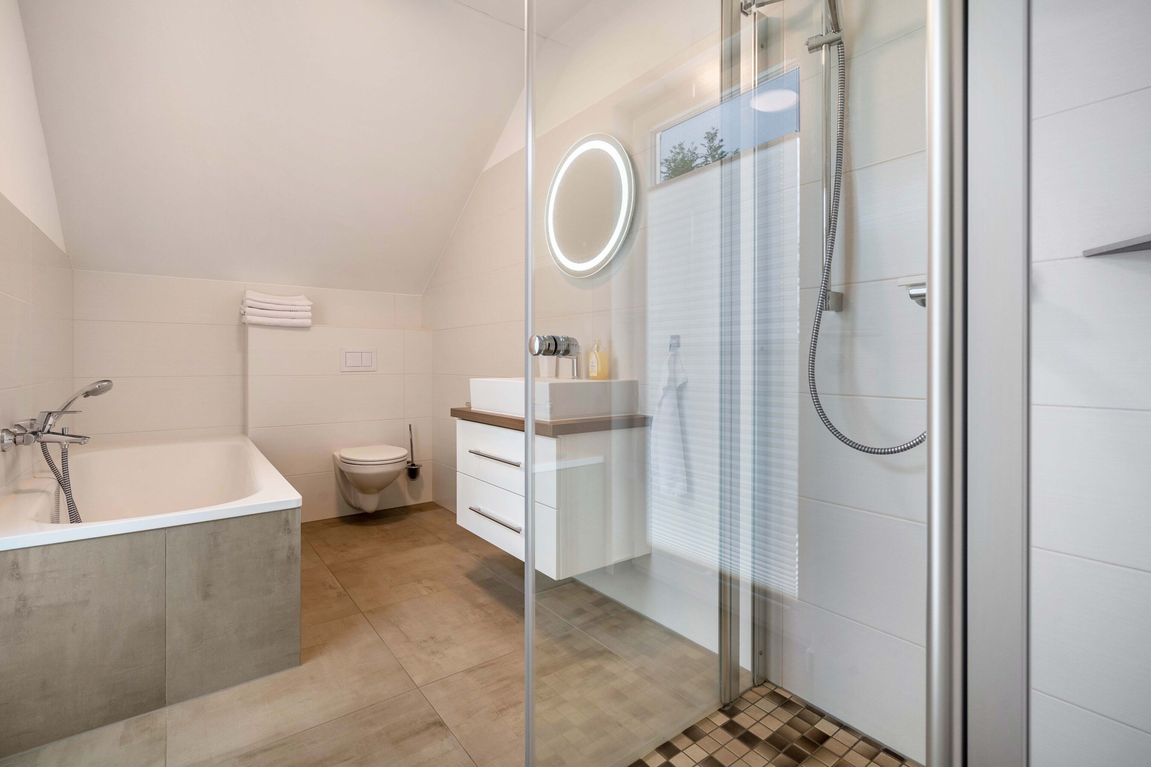 Bathtub, hair dryer, towels