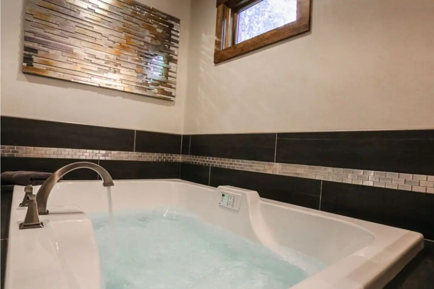 Jetted tub, hair dryer, towels, soap