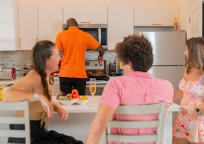 Family Apartment | Private kitchen | Full-size fridge, microwave, oven, stovetop