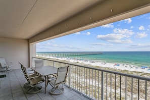 Outdoor dining - Beautiful Gulf Views |Beachfront Living |Community Pool |Fitness Room |Covered Parking |Fast WIFI (Navarre Beach)