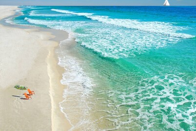 Beautiful Gulf Views |Beachfront Living |Community Pool |Fitness Room |Covered Parking |Fast WIFI