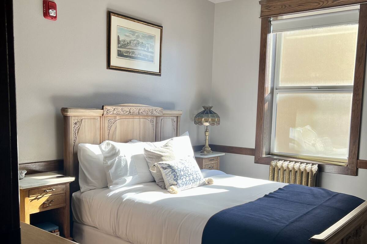 Premium bedding, down comforters, blackout drapes