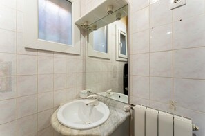 Douche, sèche-cheveux