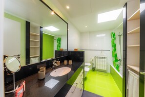 Bathtub, hair dryer, towels