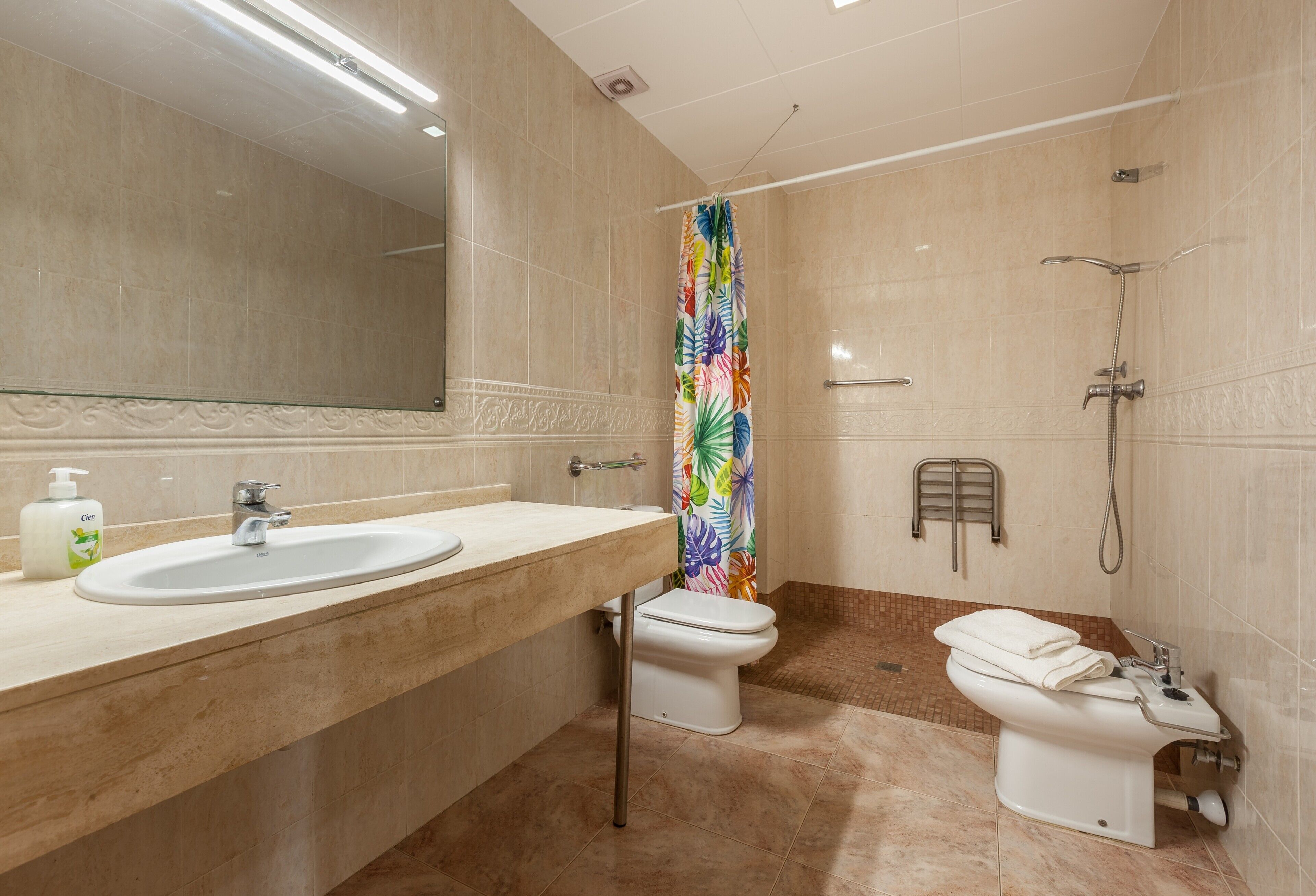 Bathtub, hair dryer, towels