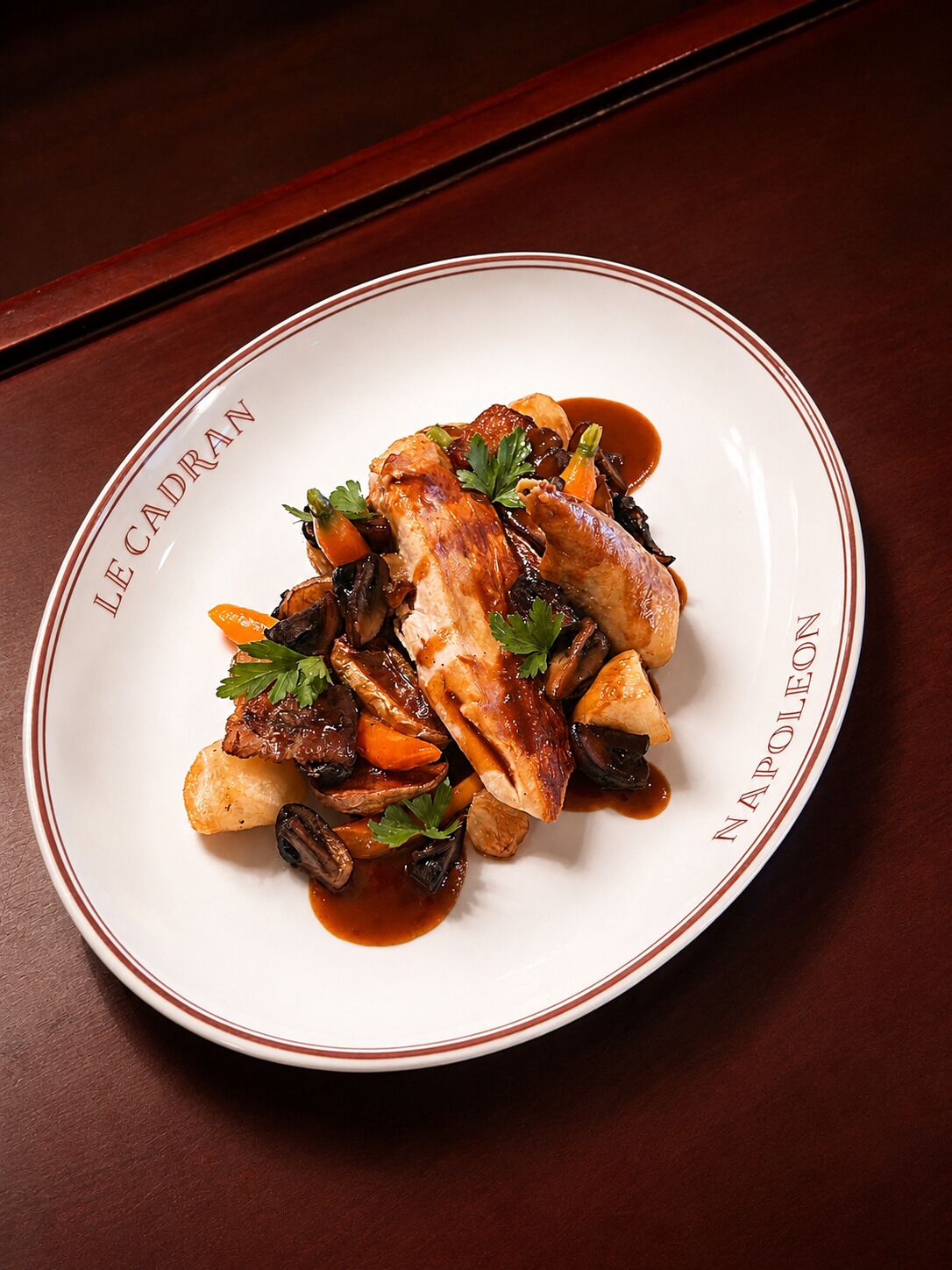 A plate of food with a white rim and text around the edge.