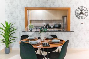 Fridge, microwave, cookware/dishes/utensils