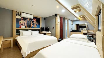 Premium bedding, memory-foam beds, desk, laptop workspace