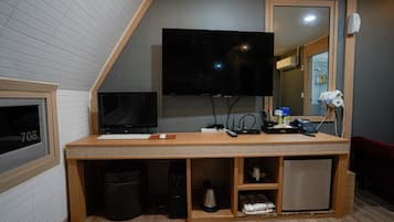 Premium bedding, memory-foam beds, desk, laptop workspace