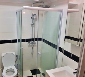 Hair dryer, towels, soap, shampoo