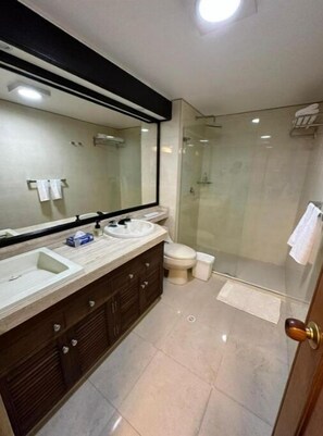 Shower, hair dryer, towels, soap