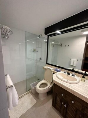 Shower, hair dryer, towels, soap