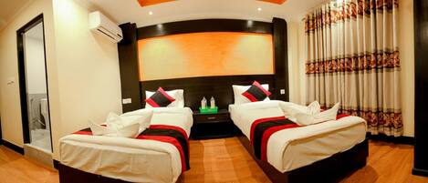 Habitación Deluxe con 2 camas individuales | Wifi gratis y ropa de cama