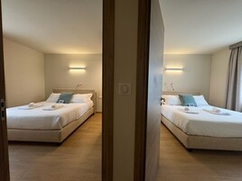 Caja fuerte, cortinas opacas, sistema de insonorización