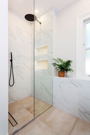 Bathtub, hair dryer, towels