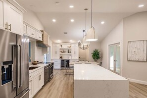 Fridge, microwave, oven, stovetop - Waterfront 4BR home with heated pool in Marco Island. (Marco Island)