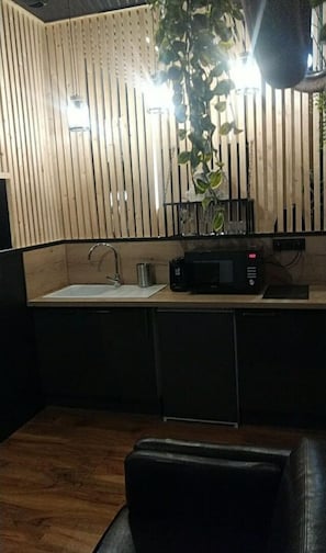 Fridge, microwave, stovetop, coffee/tea maker