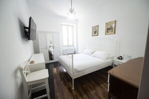 1 chambre, fer et planche à repasser, Wi-Fi gratuit, draps fournis