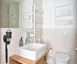 Dusj, hårf øner og håndklær