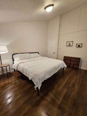 master bedroom w/ king size bed