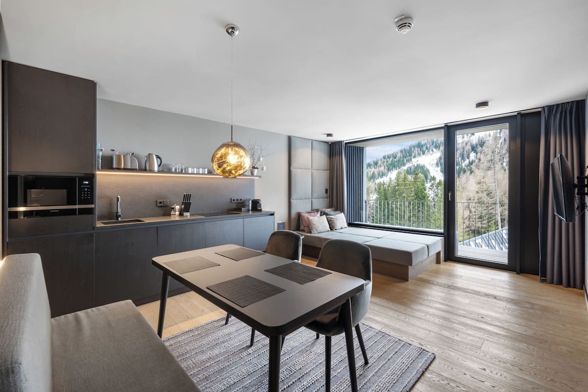 Family Suite, 2 Bedrooms | Private kitchen | Dishwasher, espresso maker, electric kettle, dining tables
