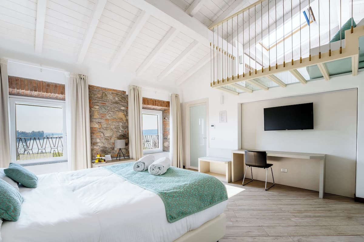 Panoramic Suite, Lake View | In-room safe, desk, laptop workspace, soundproofing