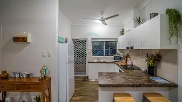Comfort Apartment | Private kitchen | Fridge, microwave, oven, stovetop