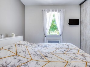 2 slaapkamers, een strijkplank/strijkijzer