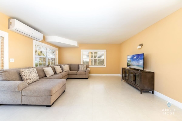 The living room is air conditioned for warm summer days.