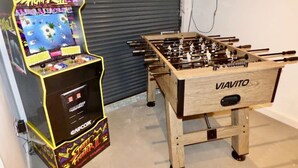A foosball table labeled 'VIAVITO' and a 'Street Fighter II' arcade machine. - blackpools (Thornton Cleveleys, Blackpool)
