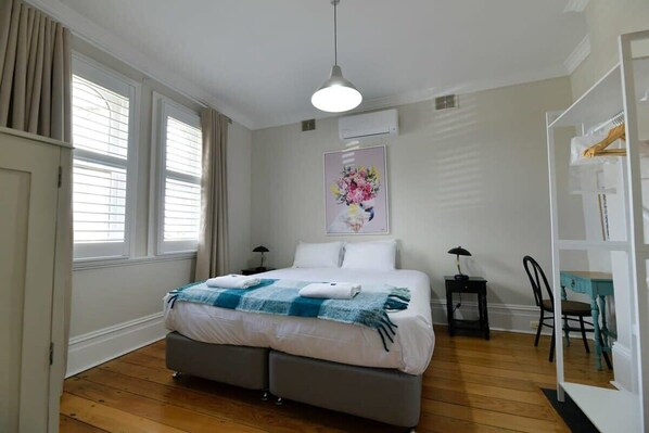 1 bedroom, desk, iron/ironing board, travel crib