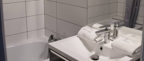 Hair dryer, towels, soap, toilet paper