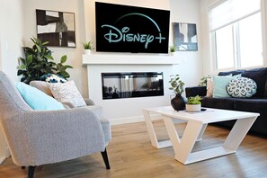 Smart TV, fireplace, books