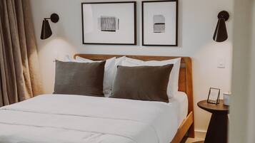 Premium Suite, 2 Bedrooms | 1 bedroom, blackout drapes, iron/ironing board, free WiFi