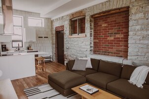 Business Suite, 1 Bedroom | Living area | 55-inch Smart TV with digital channels, TV, Netflix