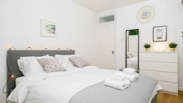 1 bedroom, desk, iron/ironing board, travel crib