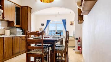 Family Apartment, 2 Bedrooms, Balcony (Seafront apartment in Gozo,) | Dining