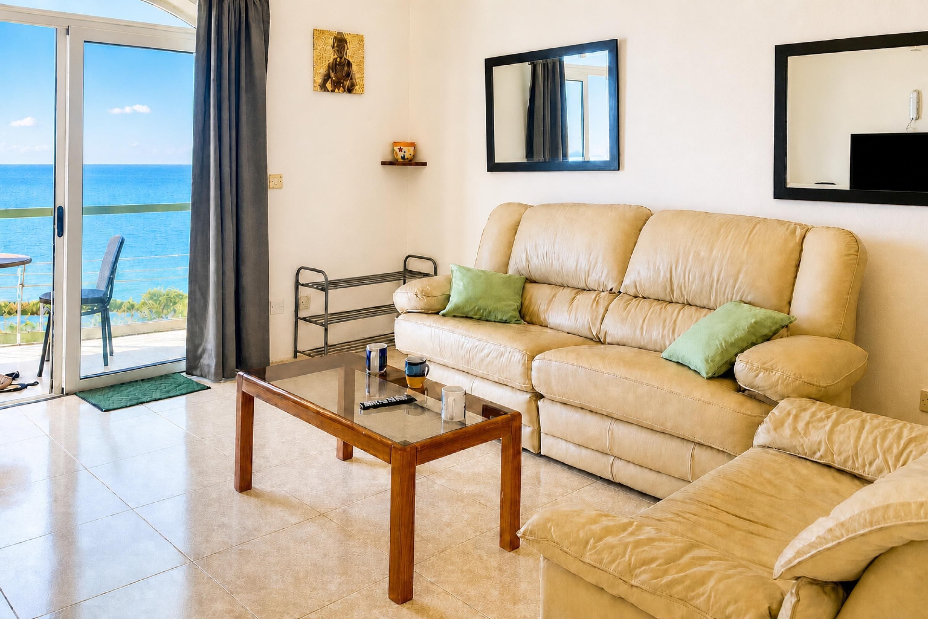 Family Apartment, 2 Bedrooms, Balcony (Seafront apartment in Gozo,) | Living area | TV